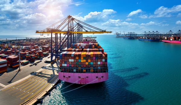 Global container shipping terminal and logistics network representing peak season inventory planning by Athletic Vision